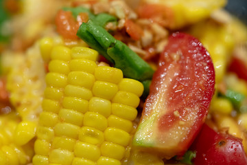 Close-up Corn papaya salad, Popular and Delicious Traditional spicy Thai food. Fastfood, Street food.