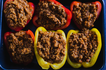 stuffed bell peppers with vegan lentil and cous cous bolognaise stuffing