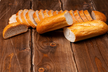 a bunch of bread on wooden background