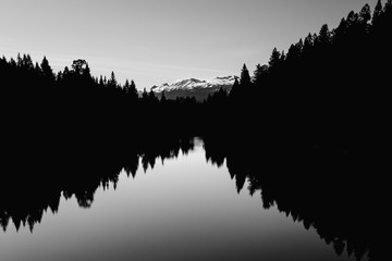Beautiful Black and white mirror reflection in Canadian lake with dominant mountain in the back ground. Valley of Five lakes, Jasper National Park, Alberta, Canada 