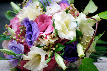 Spring Colourful Bridal Bouquet of Lisianthus Flowers and Decorative Materials. Colourful Wedding Flowers Ideas. 