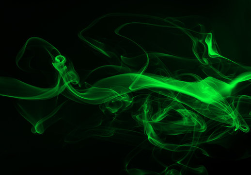 Green smoke abstract on black backgroud, darkness concept