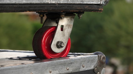 Correct and safe stacking of road cases, with the wheel locked in the indentation of the box below.