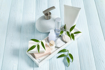 Set of bath items on wooden table