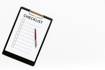 Checklist and pen on white background top view space for text