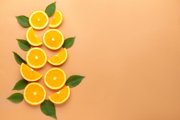 Fresh orange slices on color background