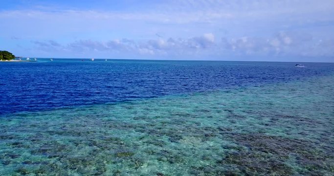 Beautiful seabed pattern of corals and rocks where many tropical fish living far from deep blue sea with big fish and sharks in Thai coastline