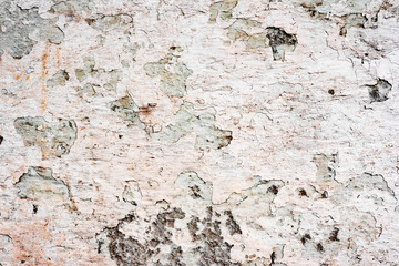 Texture of a concrete wall with cracks and scratches which can be used as a background