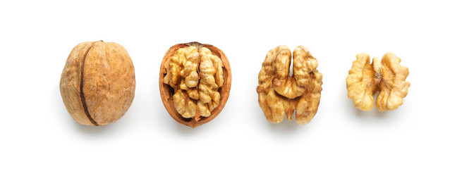 Tasty walnuts isolated on white - obrazy, fototapety, plakaty