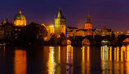 Fototapeta na wymiar Evening view of Charles Bridge with illumination. Prague. Czech Republic