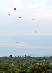 Hot air balloons clouding the historic horizon. Bagan’s balloons have become an iconic symbol of the region, and have carried many travelers on soaring adventures of Bagan, Myanmar