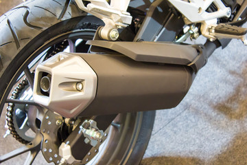 close up of a wheel of a motorcycle