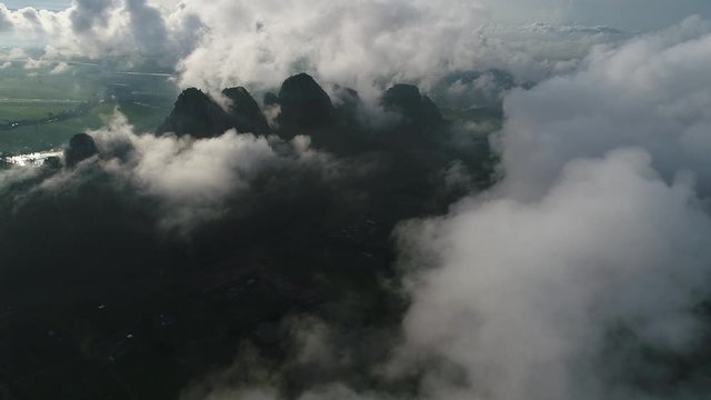 Aerial view (drone shot) of mountain landscape with sea of mist in the morning at Kao Nor-Kao Kaew ,Nakhonsawan Thailand