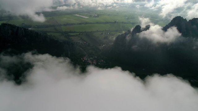 Aerial view (drone shot) of mountain landscape with sea of mist in the morning at Kao Nor-Kao Kaew ,Nakhonsawan Thailand