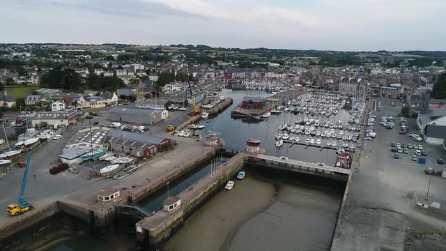 Aerial view. Gateway and Parking for boats and yachts in the Marina closed at low tide in the town of Paimpol in Northern France, in Brittany.