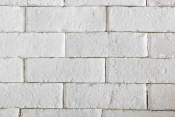 The background of a full brick wall