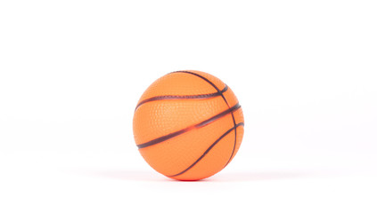 Fototapeta premium Single small rubber toy in form of basketball