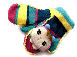 Handmade mittens for children isolated on white background. Children's little hands for the winter. Baby clothes.