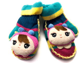 Handmade mittens for children isolated on white background. Children's little hands for the winter. Baby clothes.