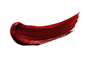Dark red lipstick swatch isolated on white. Burgundy shade lip product smear smudge sample stroke....