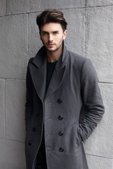 Young handsome man in coat - 304010028
