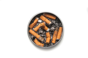 Top view of metallic ashtray full of cigarettes habits on white background