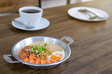 Closeup of pan fried eggs, minced pork, crab stick
