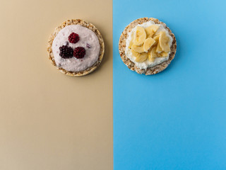 A sweet Breakfast of crispy bread, toppings and fruit. Place to add text