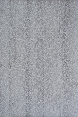 White wooden background with white spring flowers roses and lace ribbon. Happy womans day. The texture of lace on wooden background.