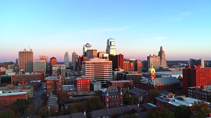 Golden Hour Sunset on Kansas City Skyline Rising Up with Drone