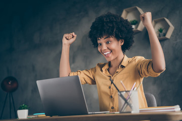 Low below angle view photo of cheerful excited executive having read reports of her workers...