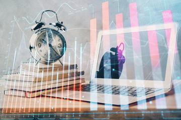 Financial market graph hologram and personal computer on background. Multi exposure. Concept of forex.