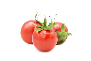 fresh organic cherry tomatoes isolated on white background