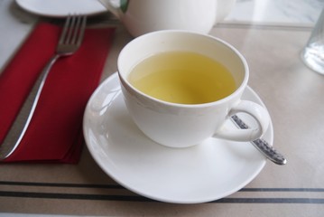 Selective focus  cup of hot tea  on  the table in the coffee shop , food and drink image for  background  or wallpaper.