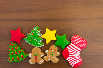 Festive tasty Christmas cookies on wooden table. Top view