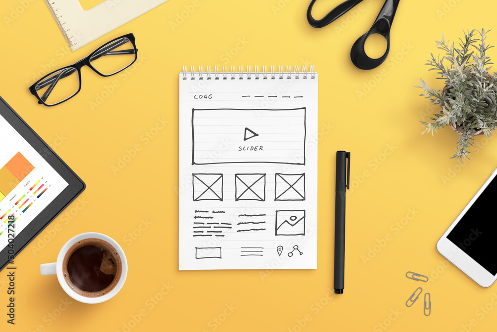 Poster Web design studio concept with web site layout sketch on paper. Orange work desk, flat lay, top view composition.