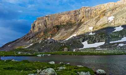 large cold lake high in the caucasus mountains