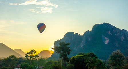 The view in the natural park called Vang Vieng in Laos with ballon and mountains with sky at the background. 