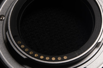Contact group on the lens on a black background