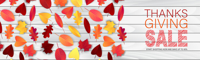 Obraz premium Thanksgiving website header or newsletter advertisement banner. Fall leaves on wooden rustic background. Traditional american holiday design concept. Vector illustration.