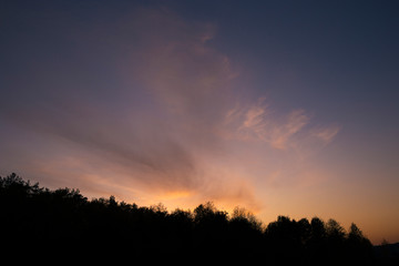 Fototapeta na wymiar Autumn sunset sky at blue hour