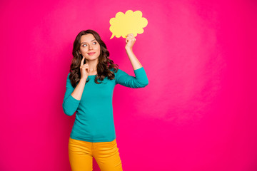 Photo of white wavy cheerful cute nice pretty girlfriend holding yellow bubble for thoughts with hands pondering over new ideas isolated vivid color pink background