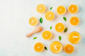 orange juice in a glass, top view, slices of oranges, straw, healthy lifestyle concept
