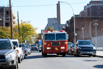 Fototapeta na wymiar Fast fire engine in Manhattan, New York City.