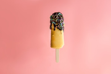 ice cream sticks on pastel colors background