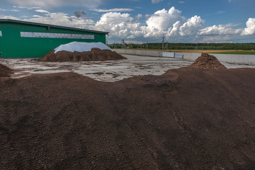 peat processing plant, warehouse of raw materials and finished products