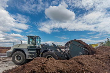 peat processing plant, warehouse of raw materials and finished products