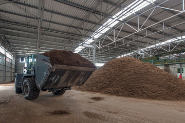 loading of peat raw materials, at the processing plant