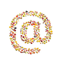 Vegetarian ABC. Fruits on white background forming @ sign