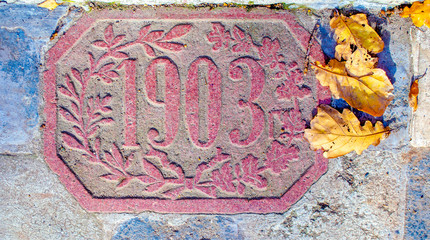 numbers on concrete tile